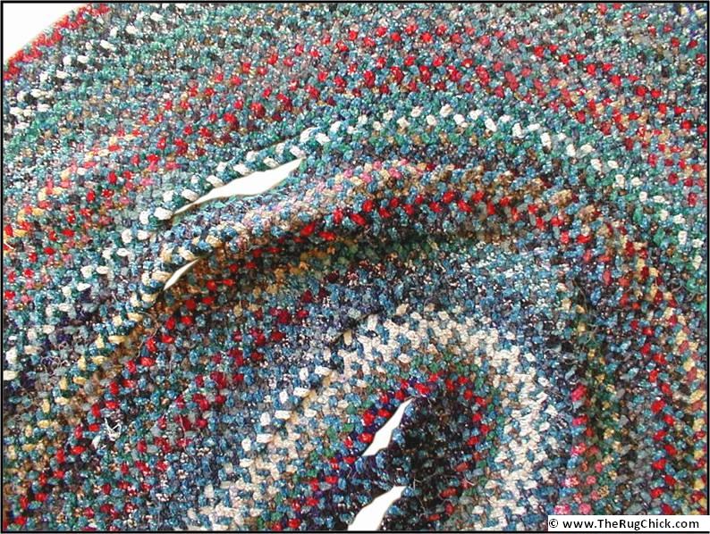 Braided rug coming unraveled.
